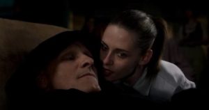 Timlin (Kristen Stewart) is sexually aroused by Saul Tenser (Viggo Mortensen)'s surgical performance in David Cronenberg's Crimes of the Future (2022)