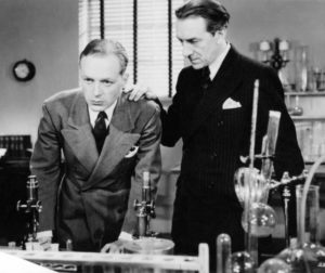 Dr. Edward B. Walker (Pedro de Cordoba) explains the facts about syphilis to George Dupont (Douglas Walton) in Phil Goldstone's Damaged Goods (1937)