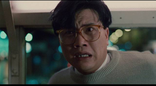 ... newspaper employee Yuen-Ting (Alex Man) who is initially terrified in Stanley Kwan's Rouge (1987)