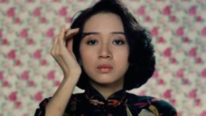 Courtesan Fleur (Anita Mui) prepares her public persona at the beginning of Stanley Kwan's Rouge (1987)