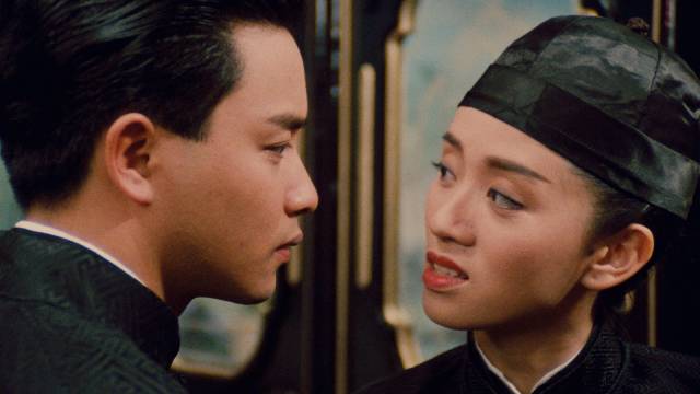 Gender and social roles are fluid as Chan (Leslie Cheung) first meets Fleur (Anita Mui) performing in the brothel in Stanley Kwan's Rouge (1987)