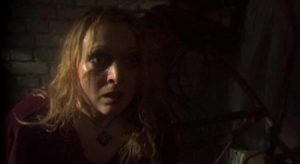 Something dark has escaped from Mira (Cora Chilcott) during her session with the faith healer in Andreas Marschall's Tears of Kali (2004)