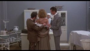Jekyll (Anthony Perkins)'s first encounter with prostitute Susannah (Sarah Maur Thorp) at the hospital in Gérard Kikoïne’s Edge of Sanity (1989)