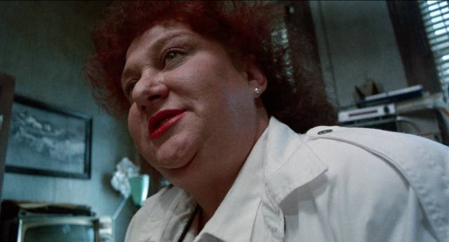 Pat Ast as sadistic and sexually predatory guard Edna in Tom DeSimone's Reform School Girls (1986)