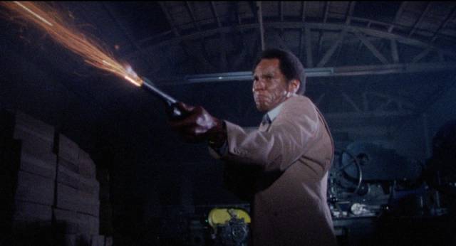 Detective Lou Capell (David Moses) faces down the Syngenor in William Malone's Scared to Death (1980)