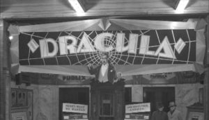 A movie marquee promoting Tod Browning's Dracula in David Mitchell & Jamie Lockhart's The Trail of Dracula (2016)