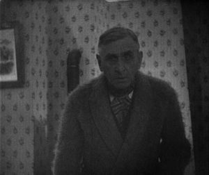 The chatelain (Maurice Schutz) visits Allan (Nicholas de Gunzburg) in the middle of the night in Carl Th. Dreyer's Vampyr (1932)