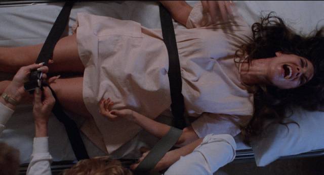 A routine check-up becomes a nightmare for Susan (Barbi Benton) in Boaz Davidson's X-Ray (1983)
