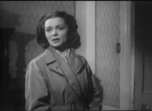 The murdered maid (Victoria Hopper) returns to confront her killer in John Gilling's Escape from Broadmoor (1948)