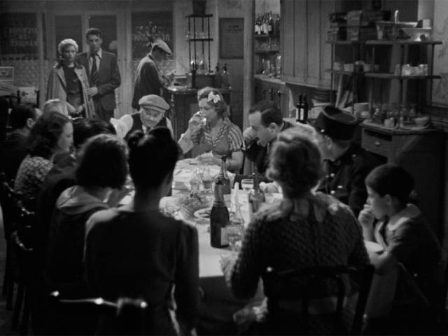 Renée (Annabella) and Pierre (Jean-Pierre Aumont) arrive at the hotel during a celebratory party in Marcel Carné’s Hôtel du Nord (1938)