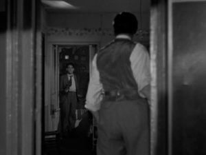 Edmond (Louis Jouvet) confronts Pierre (Jean-Pierre Aumont) after he has shot Renée (Annabella) in Marcel Carné’s Hôtel du Nord (1938)