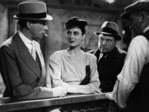 Edmond (louis Jouvet)'s old criminal associates come looking for him in Marcel Carné’s Hôtel du Nord (1938)