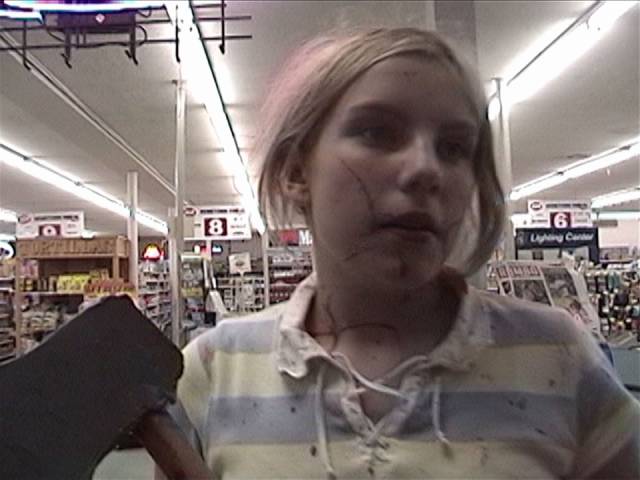Dannie (Rose Kent-McGlew) cleans up in aisle 4 in 12-year-old Emily Hagins’s Pathogen (2006)
