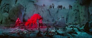 Ilmarinen (Ivan Voronov) ploughs a rocky field for the sorceress Louhi (Anna Orochko) in Aleksandr Pyushko's Sampo (1959)