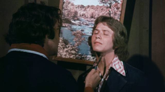 Bobby (Stephen White) is assaulted by his "rescuer" Jake (Bob Barbour) in Joe Wiezycki’s Satan’s Children (1975)