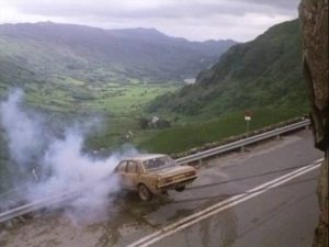 Ian (Edward Woodward) goes off the road, just as he did in his dream in Lindsey C. Vickers' The Appointment (1981)