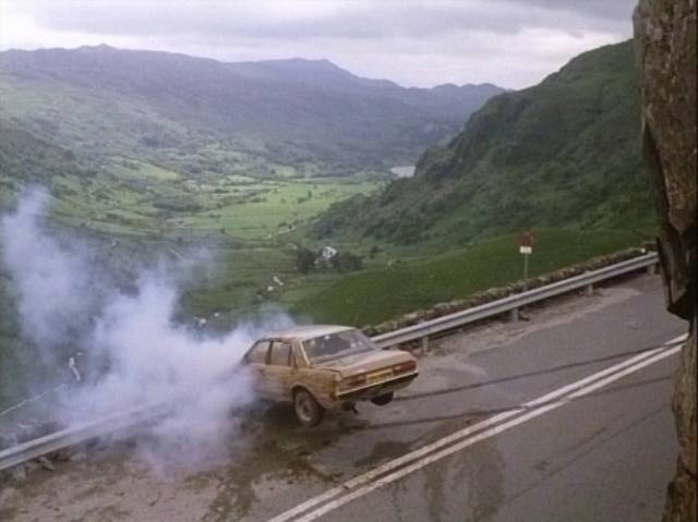 Ian (Edward Woodward) goes off the road, just as he did in his dream in Lindsey C. Vickers' The Appointment (1981)