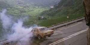 Ian (Edward Woodward) goes off the road, just as he did in his dream in Lindsey C. Vickers' The Appointment (1981)