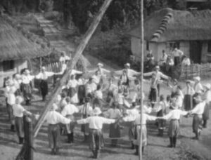 Villagers celebrate the harvest just before the Russian army arrives in Edgar G. Ulmer's Cossacks in Exile (1938)