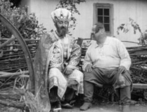 Ivan meets the Sultan (Nicholas Harlash), who's travelling incognito in Edgar G. Ulmer's Cossacks in Exile (1938)