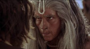 Rosalie Crutchley as the tribe's shaman in Don Chaffey's Creatures the World Forgot (1971)