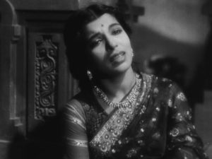 Uma (Amala Uday Shankar) becomes Udayan (Uday Shankar)'s partner in his cultural project in Uday Shankar’s Kalpana (1948)