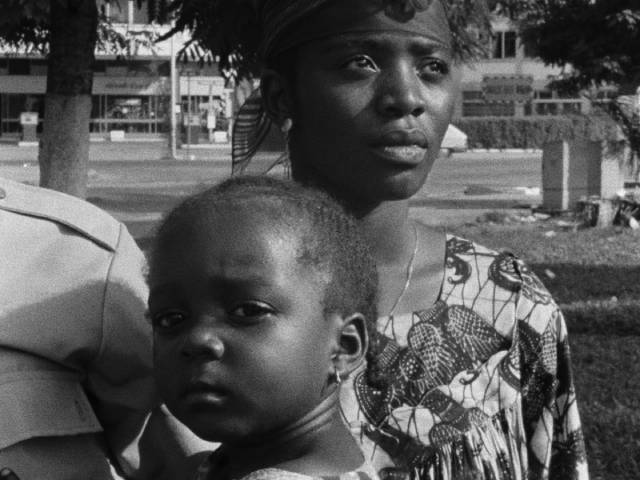 Even the child has an accusatory look in Dikongué-Pipa‘s Muna Moto (1975)