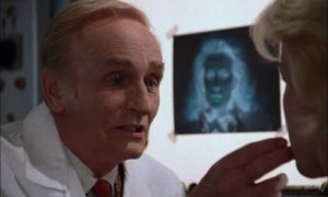 A surgeon (Anton Diffring) looks for just the right face in Jess Franco's Faceless (1988)