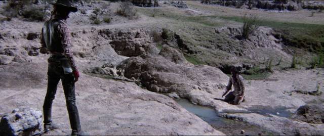 Eric (Ricardo Noriega) confronts Emiliano (Eric del Castillo) when the bounty hunter is disoriented by seemingly supernatural events in Fernando Duran Rojas’ Vibora caliente aka Hot Snake (1976)