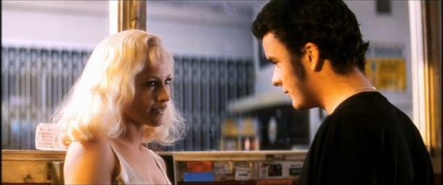 Mr. Eddy (Robert Loggia)'s girl Alice (Patricia Arquette) invites Pete (Balthazar Getty) to dinner in David Lynch's Lost Highway (1996)