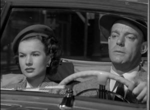 Reporter Mark Sitko (Dennis O’Keefe) helps Paula Considine (Gale Storm) search for her sister in Joseph M. Newman's Abandoned (1949)