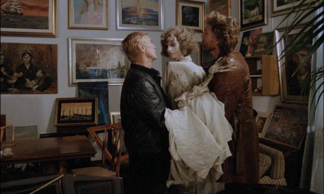 Saint Simon and faithful servant Hermann (Gordon Mitchell) retrieve the wife's body from the family crypt in Sergio Bergonzelli’s Blood Delirium (1988)