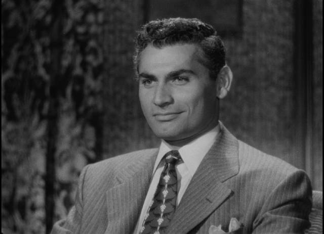 Forcibly returned to Italy, criminal Vic Smith (Jeff Chandler) has to find a way to reconnect with his loot in Robert Siodmak's Deported (1950)