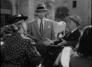 Vic Smith (Jeff Chandler) isn't happy to be reunited with his Italian relatives in Robert Siodmak's Deported (1950)