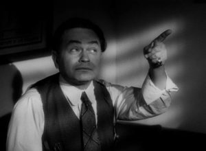 Walter's boss Barton Keyes (Edward G. Robinson) has a nose for dishonesty in Billy Wilder’s Double Indemnity (1944)
