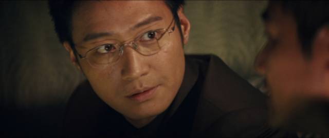 SP Yeung Kam Wing (Leon Lai) works to expose Lau as a mole in Andrew Lau Wai-keung and Alan Mak’s Infernal Affairs III (2003)