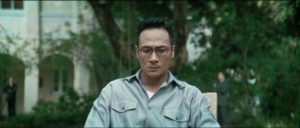 Yan (Tony Leung Chiu-Wai)'s half-brother Ngai Wing Hau (Francis Ng) takes over the gang after the assassination of his father in Andrew Lau Wai-keung and Alan Mak’s Infernal Affairs II (2003)