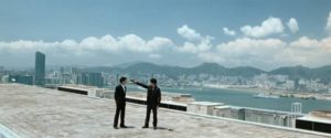 An undercover cop (Tony Leung Chiu-Wai) and a triad mole (Andy Lau) face off on a Hong Kong rooftop in Andrew Lau Wai-keung and Alan Mak's Infernal Affairs (2002)