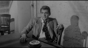 Al Willis (Gene Barry) can't conceal his hatred of cops in Jerry Hopper's Naked Alibi (1954)