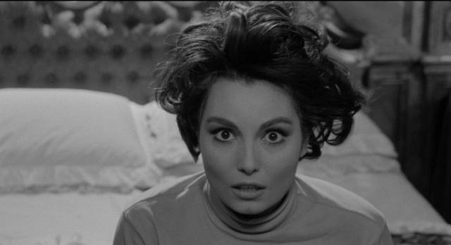 Aura (Rosanna Schiaffino) exerts an erotic power over writer Sergio Logan (Richard Johnson) in Damiano Damiani's The Witch (1966)