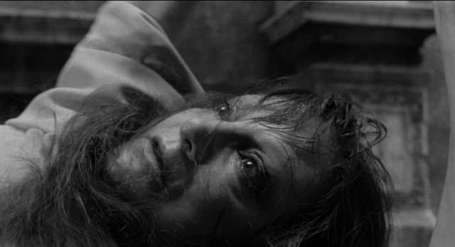 Consuelo Lorente (Sarah Ferrati) is dragged to a grim fate in Damiano Damiani's The Witch (1966)