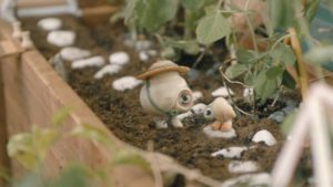 Marcel and Nana Connie gardening in Dean Fleischer-Camp's Marcel the Shell with Shoes On (2021)