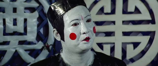 Wah Li (Sammo Hung) disguises himself as a mannequin in Wu Ma's The Dead and the Deadly (1982)