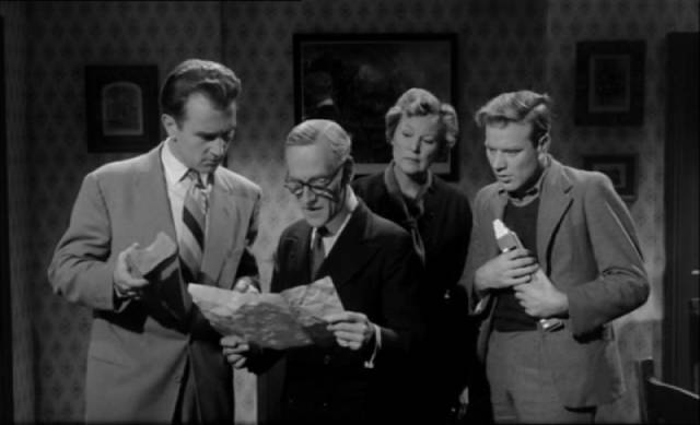 Residents of a boarding house read a threatening note in Vernon Sewell's Edgar Wallace mystery Urge to Kill (1960)