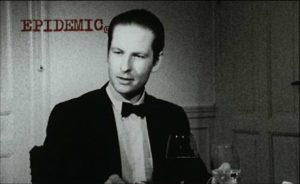 Lars von Trier, filmmaker, watches the hypnosis session go very wrong in Lars von Trier's Epidemic (1987)