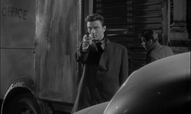Rave (Laurence Harvey) casually shoots an armoured car guard in Lewis Gilbert's The Good Die Young (1954)