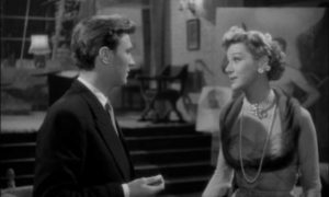 Rave (Laurence Harvey) can't believe his wife Eve (Margaret Leighton) is cutting off his finances in Lewis Gilbert's The Good Die Young (1954)