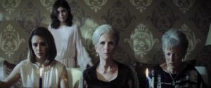 Carmen (Margarita Kenéfic) and her friends conduct a seance in Jayro Bustamante’s La llorona (2019)