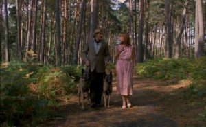 Morel persuades Elisabeth (Nicole Calfan) to get a dog for protection in Alain Jessua's Les Chiens (1978)