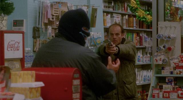 Kellen O’Reilly (Michael Ironside) interrupts a fake robbery in Jean-Claude Lord's Mindfield (1989)